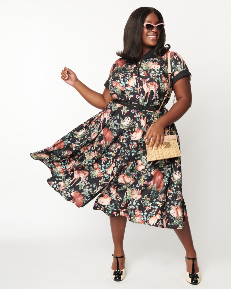 Front of a model wearing a size 3X/20 Unique Vintage Plus Size Woodland Creatures Print Alexis Swing Dress in Woodland Creatures by Unique Vintage. | dia_product_style_image_id:269931